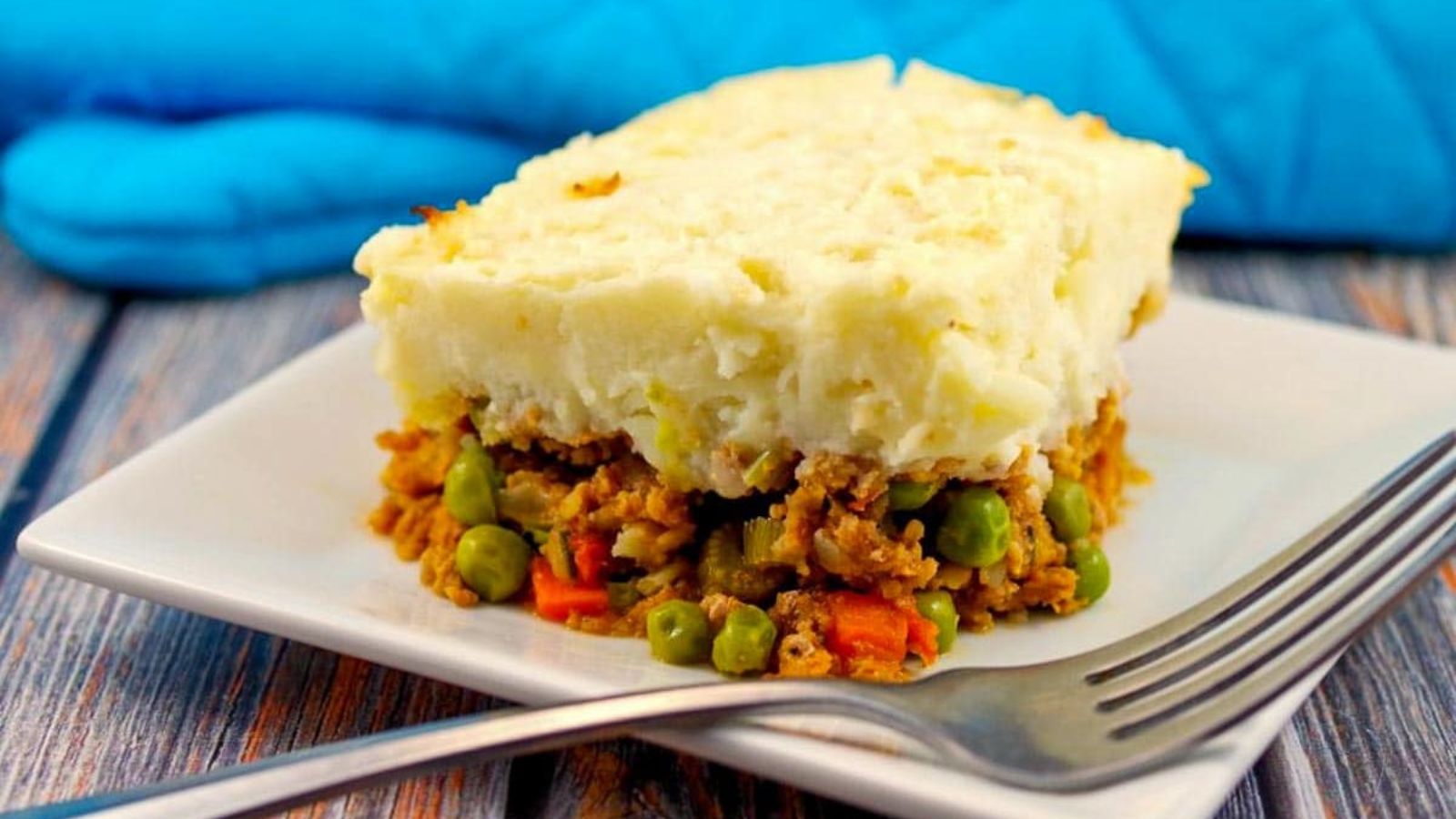 A slice of shepherd's pie on a plate.