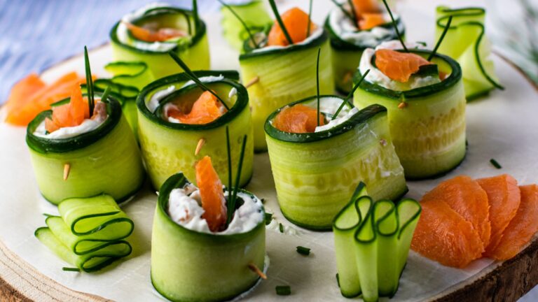 Salmon cucumber appetizers on a plate.