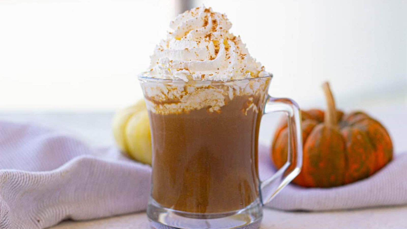 Pumpkin spice latte with whipped cream.