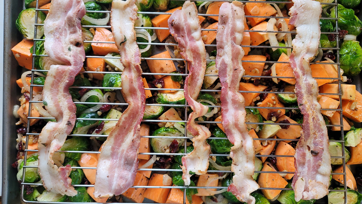 Bacon added the a cooling rack on top of the vegetables.