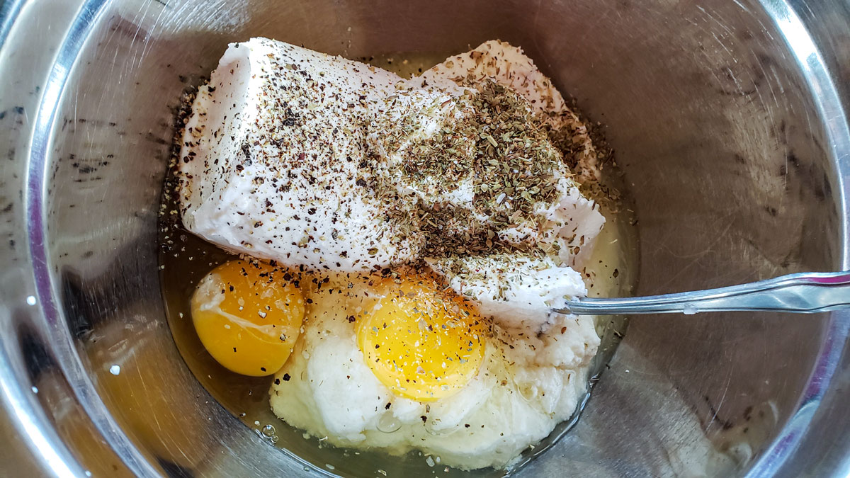 Ingredients for the cheese layer in a medium bowl.