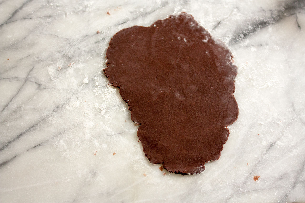 Rolled out dough on the waxed paper.