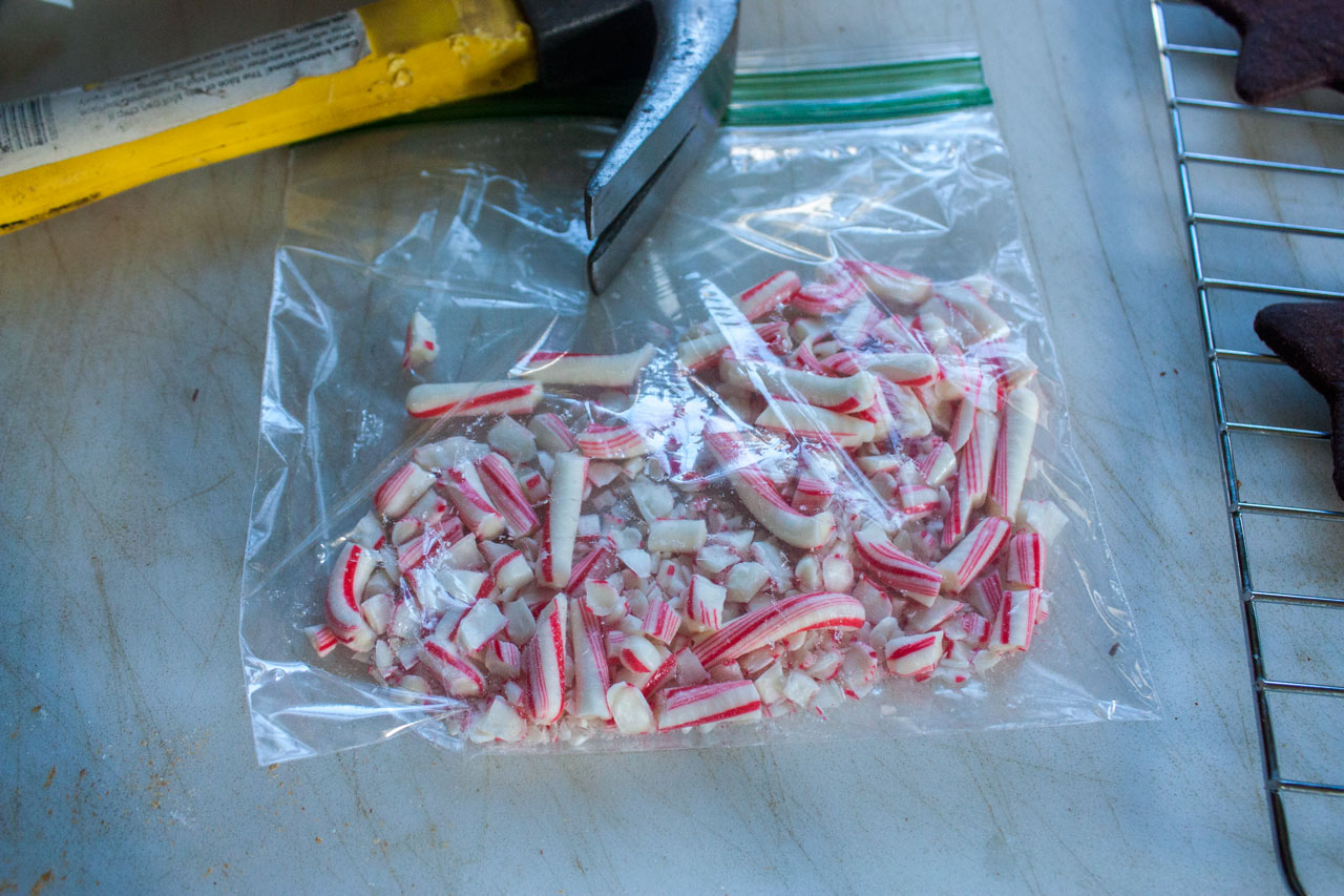 Crushing candy canes with a hammer.