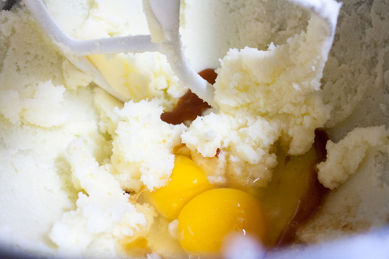 Eggs added to the mixing bowl.