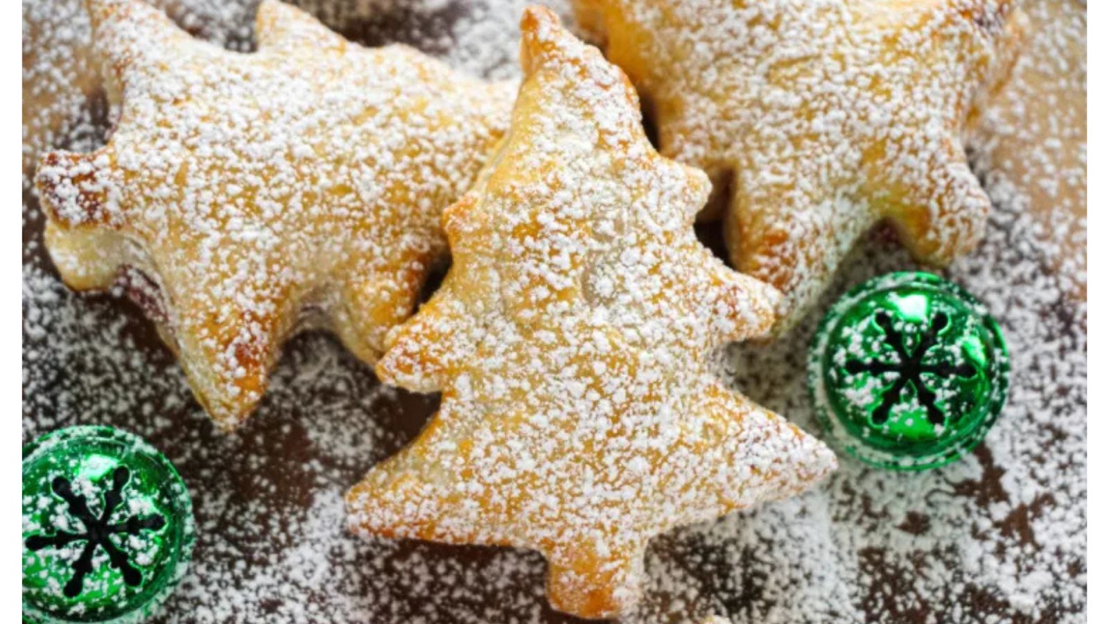 Christmas tree shaped puff pastry sprinkled with powdered sugar.