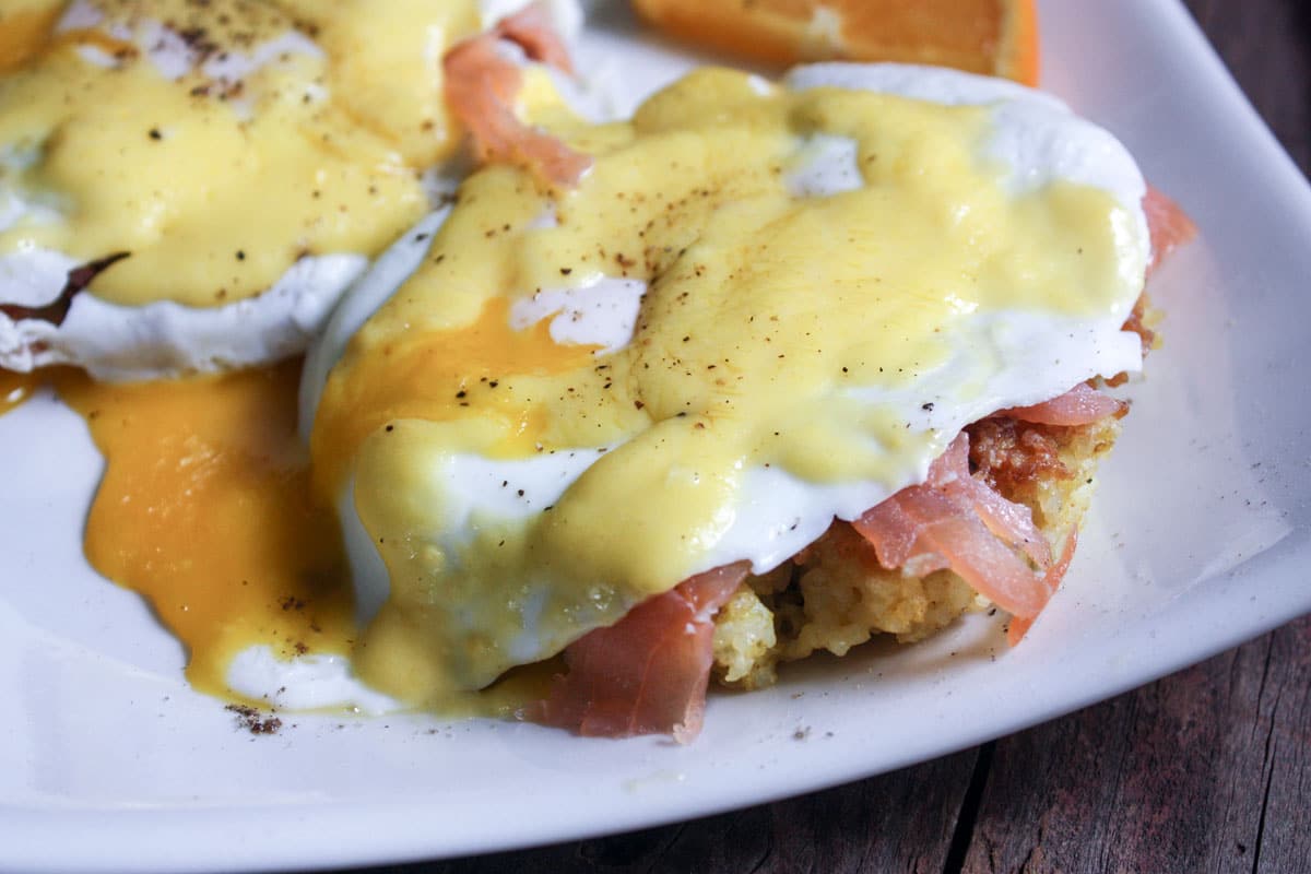 Eggs Benedictclose up of broken yolks