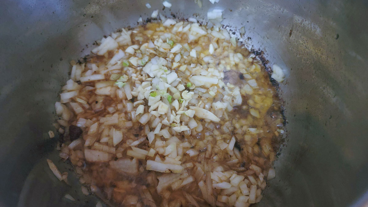 Garlic added to the onions.
