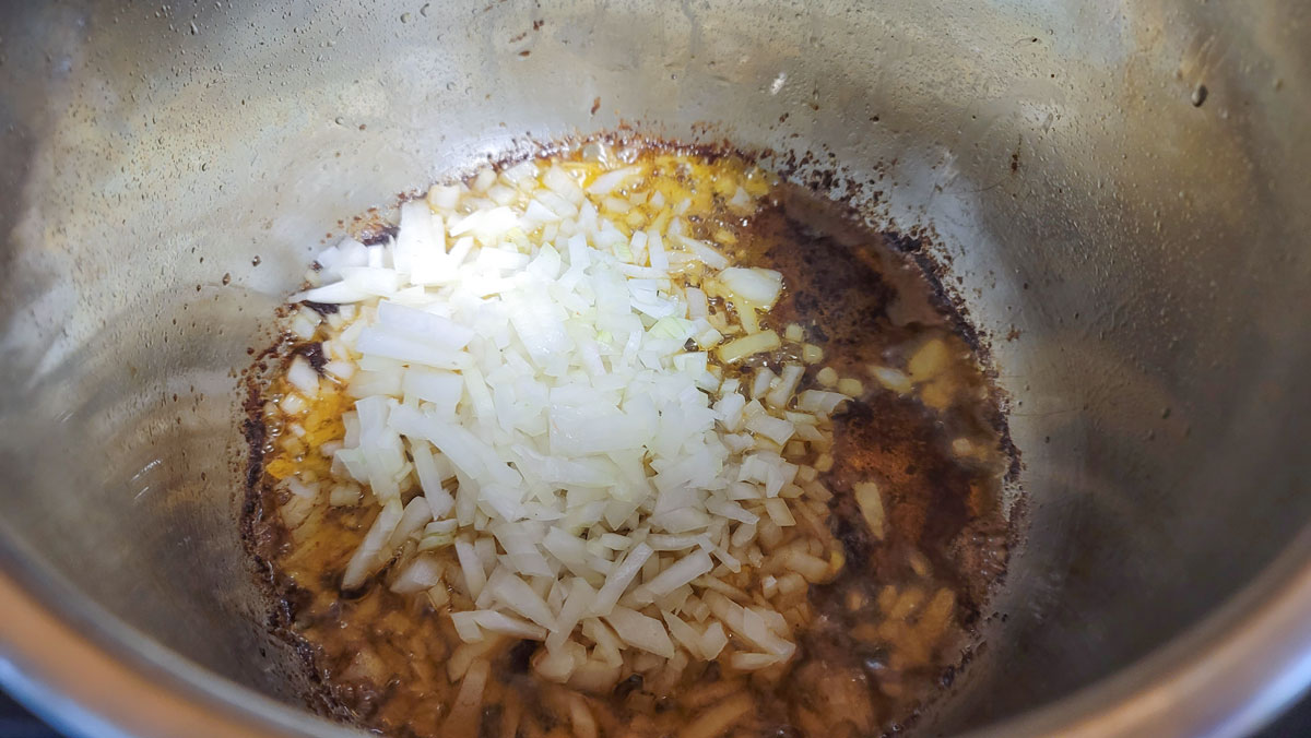 Sautéing the onions in the instant pot.