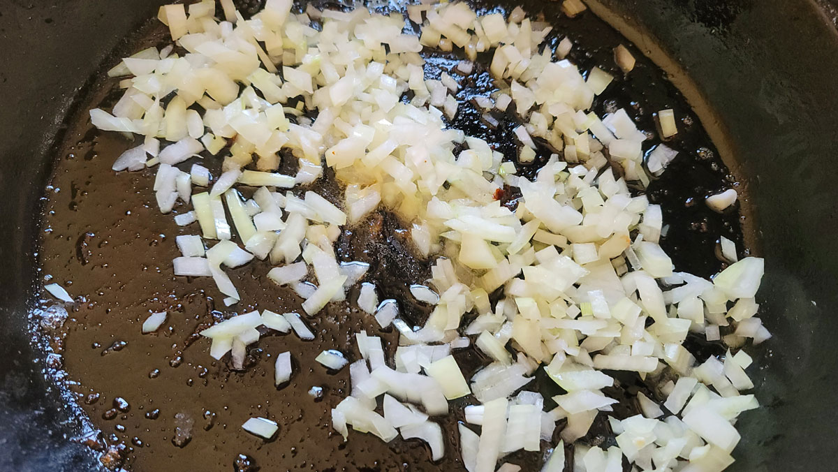 Onions sautéing in the skillet.