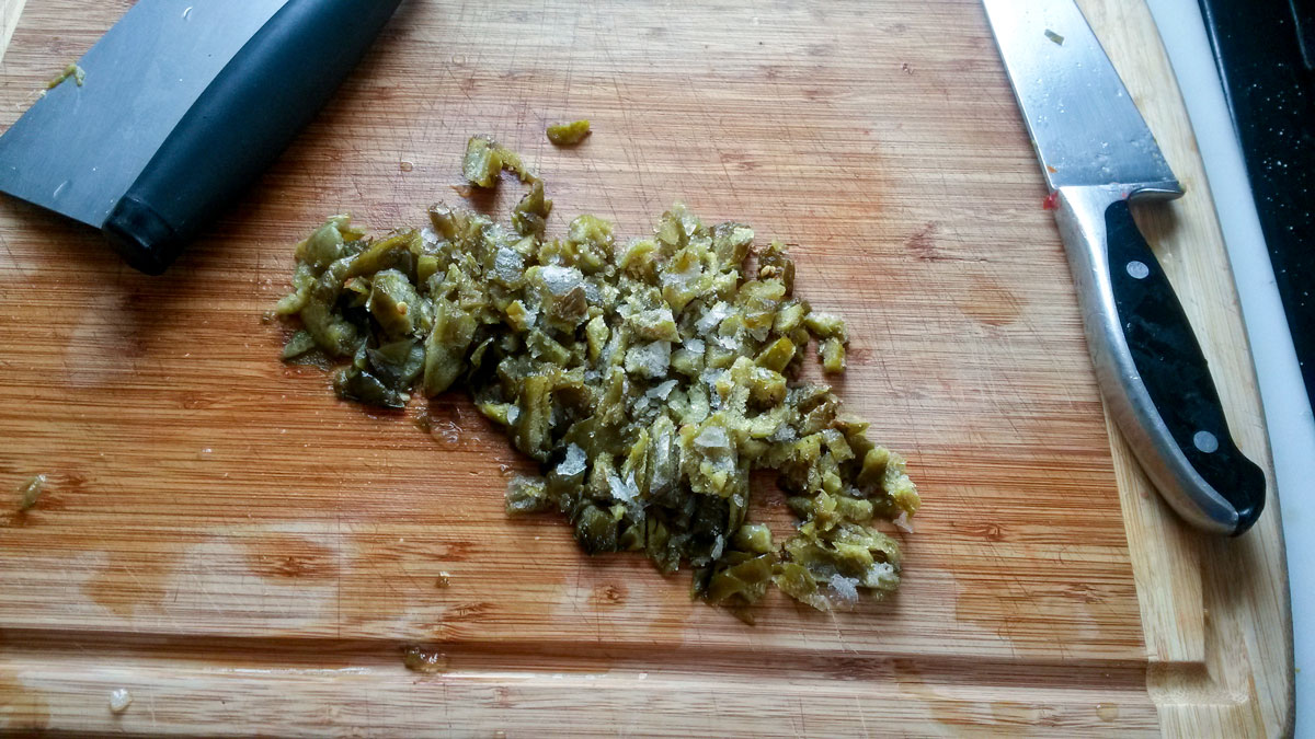 Chopped peppers on a board.