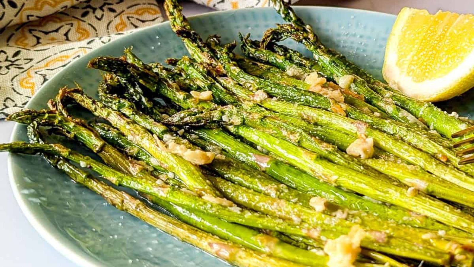 Fried asparagus on a plate.