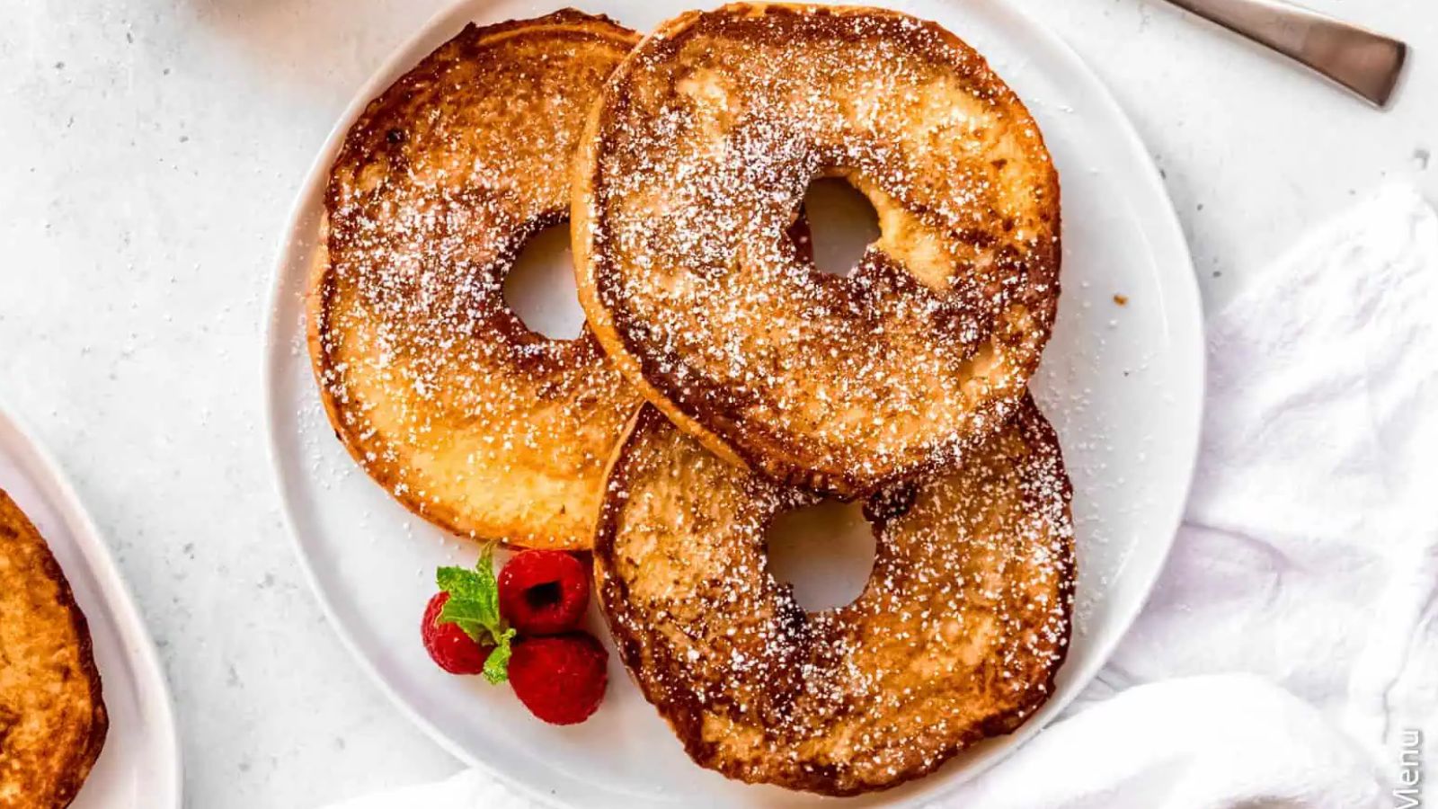 Bagel french toast on a plate.