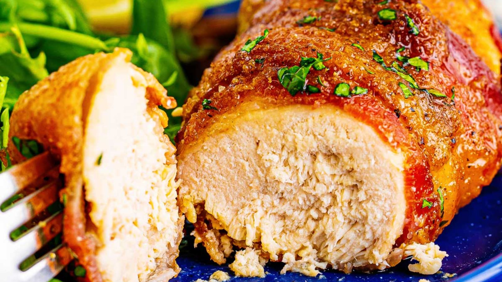 Sliced bacon wrapped chicken.