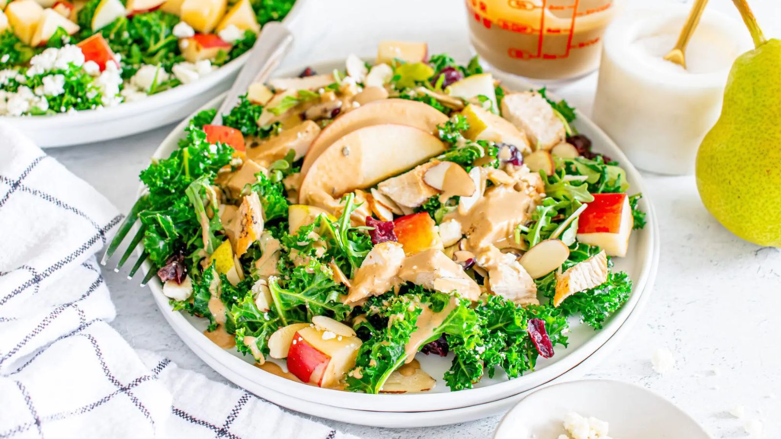 Salad with chicken on a plate.