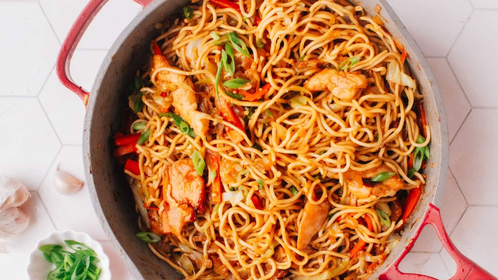 Chow mein noodles in a pan.