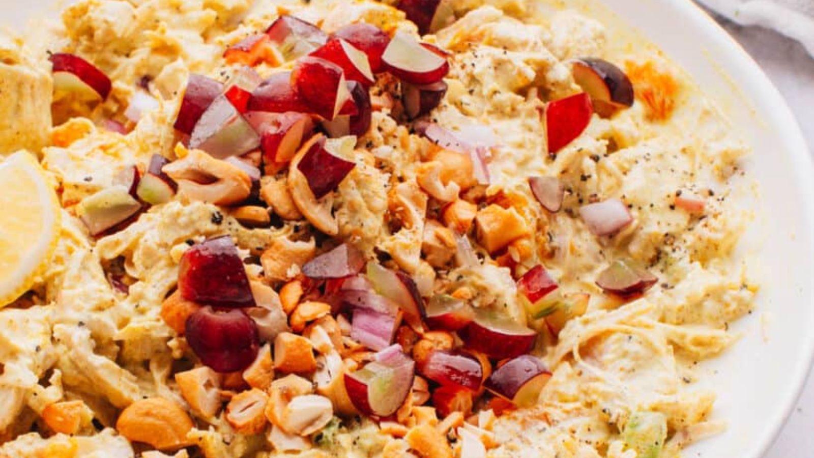 Chicken salad with sliced apples.