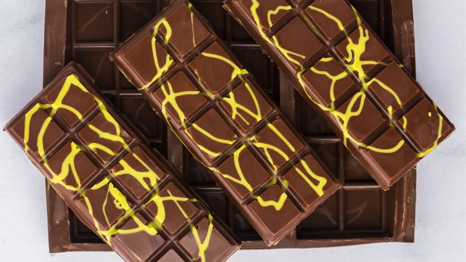 Three bars of chocolates.