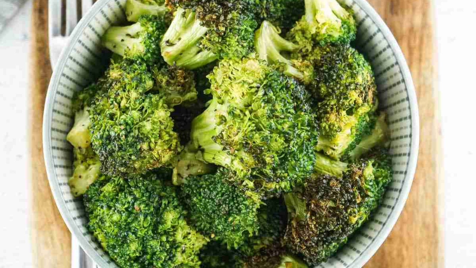 Air fried broccoli in a bowl.