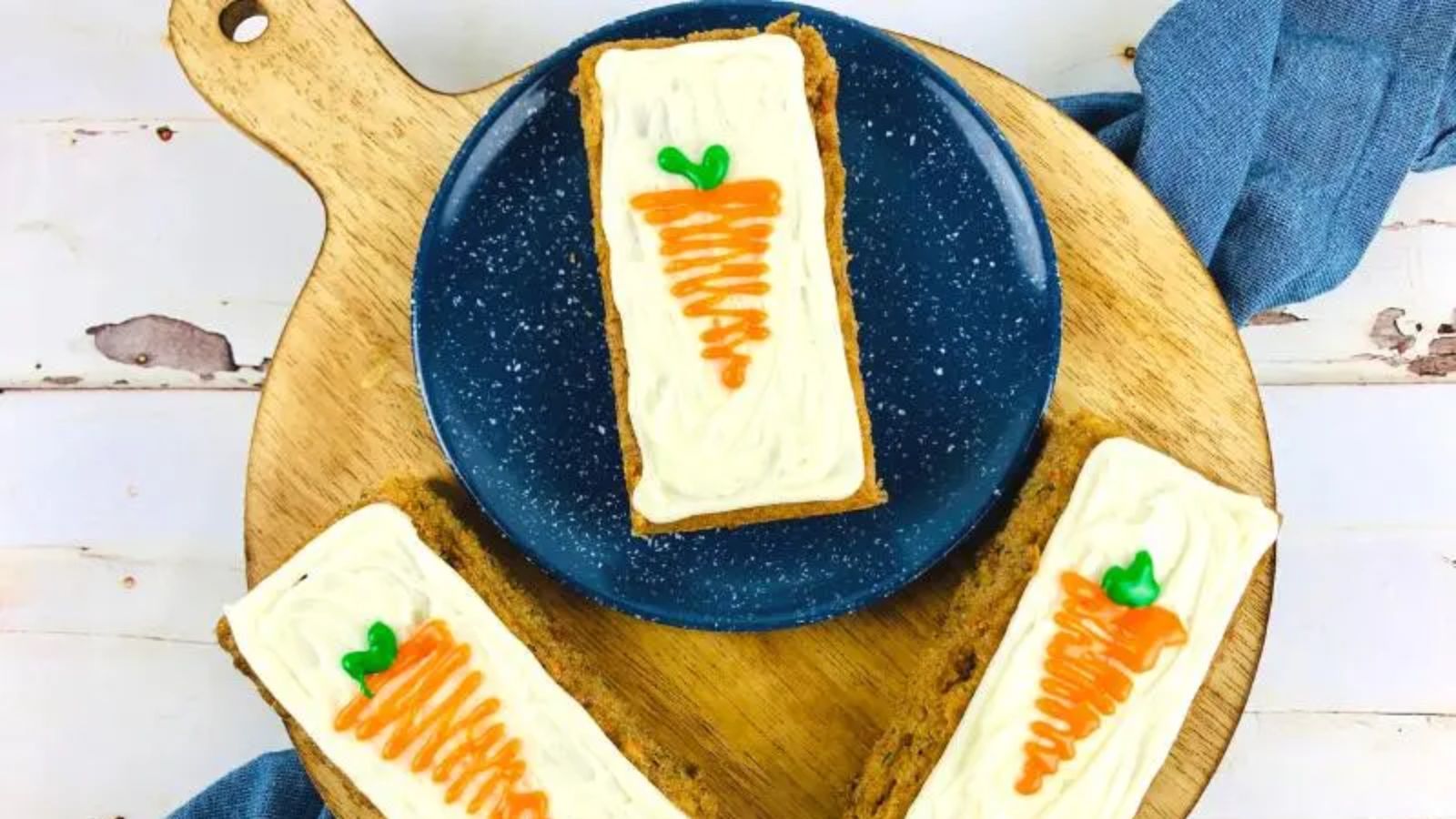 Carrot zucchini bars on a plate and wooden board.