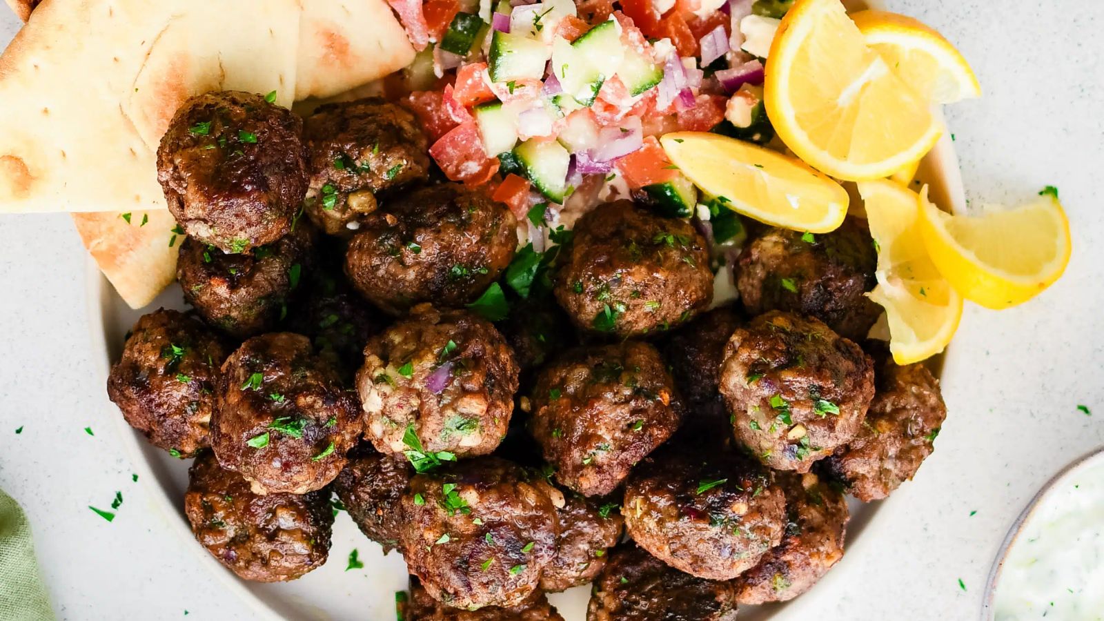 Greek meatballs on a plate.