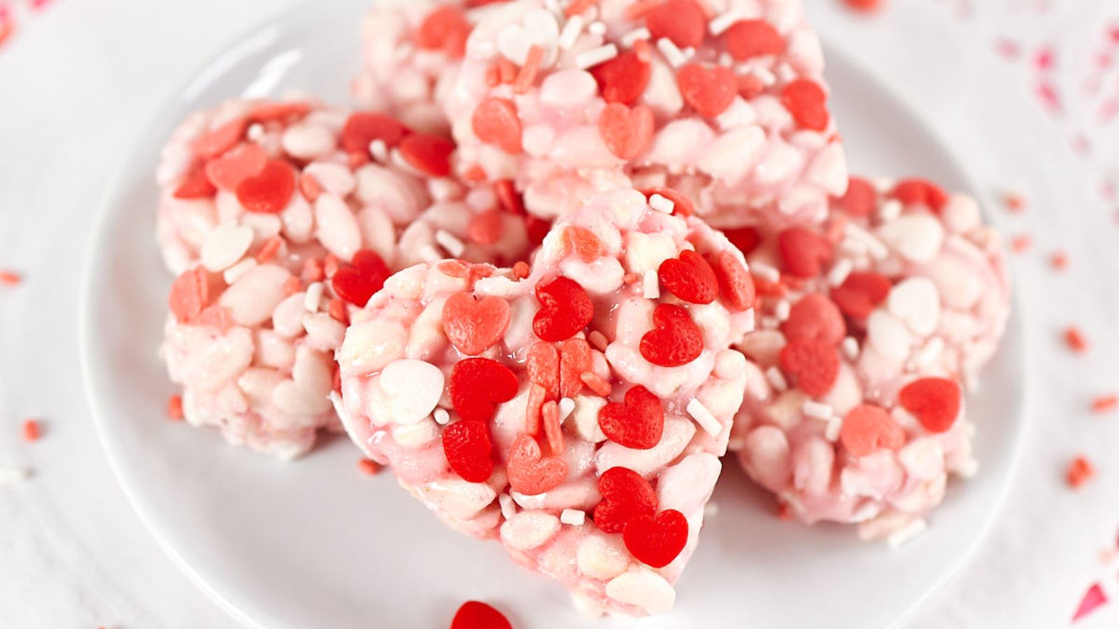 Heart shaped rice krispies on a plate.