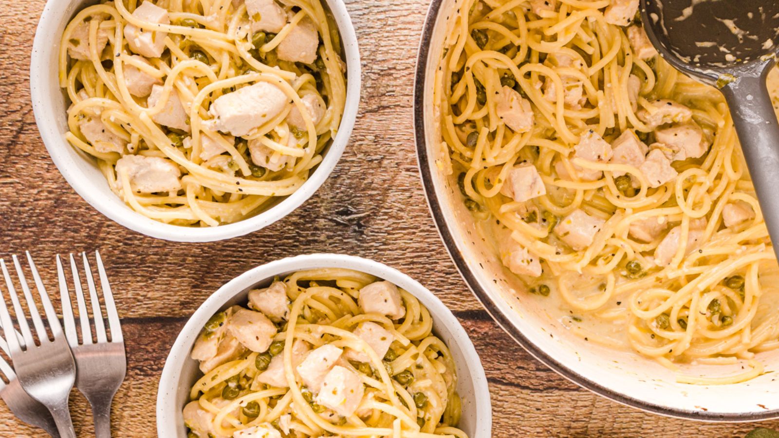 Chicken piccata pasta in bowls.