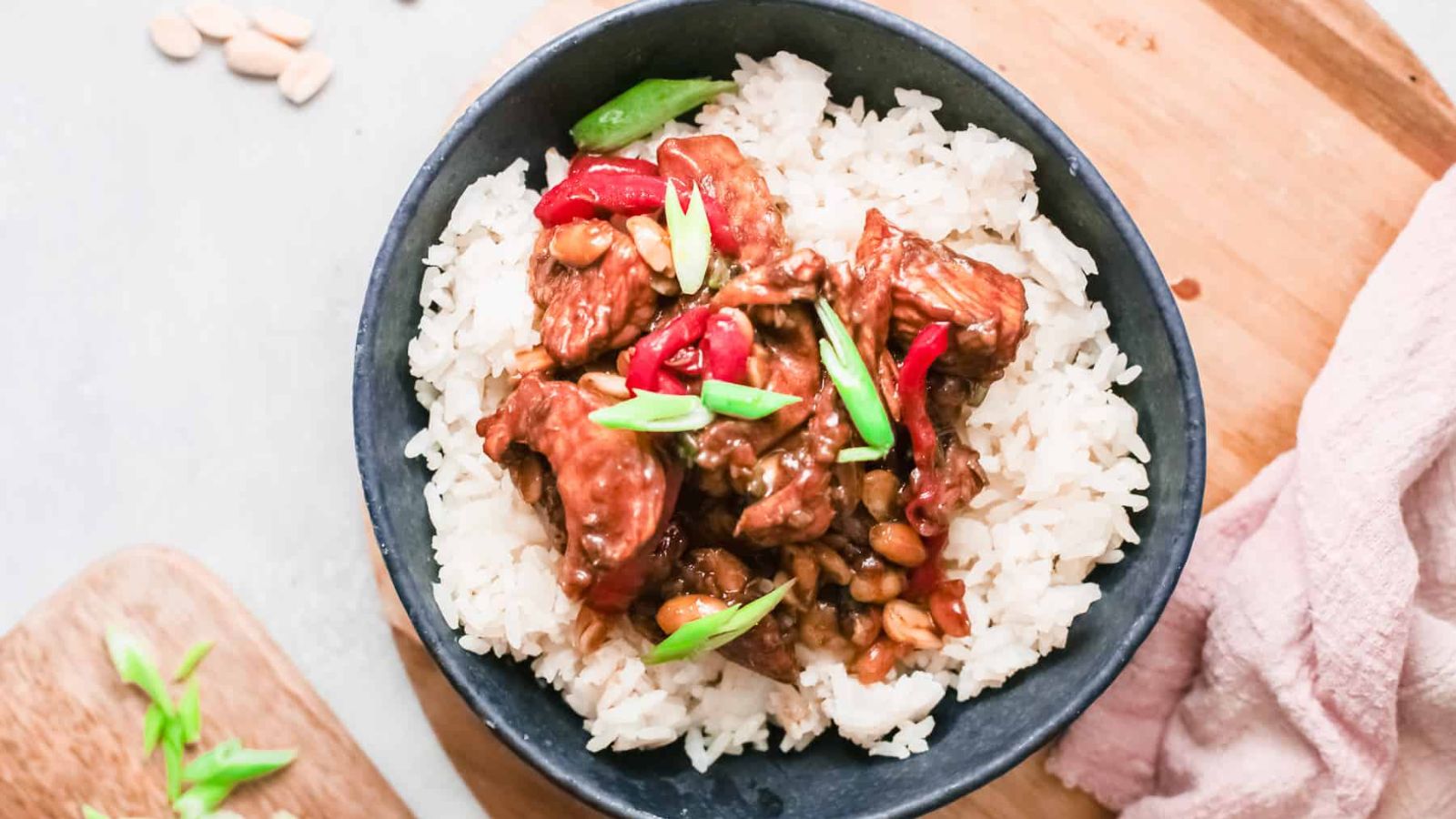 Rice with kung pao chicken on top.