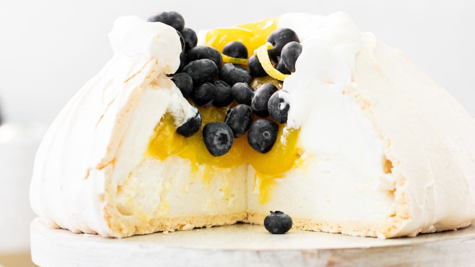 Lemon curd pavlova with berries.