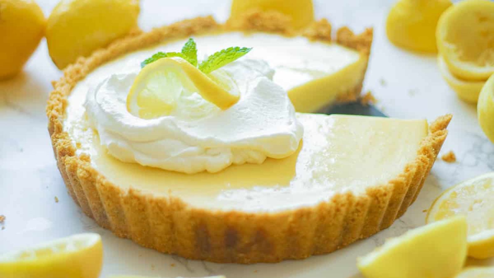 Lemon pie with a slice.
