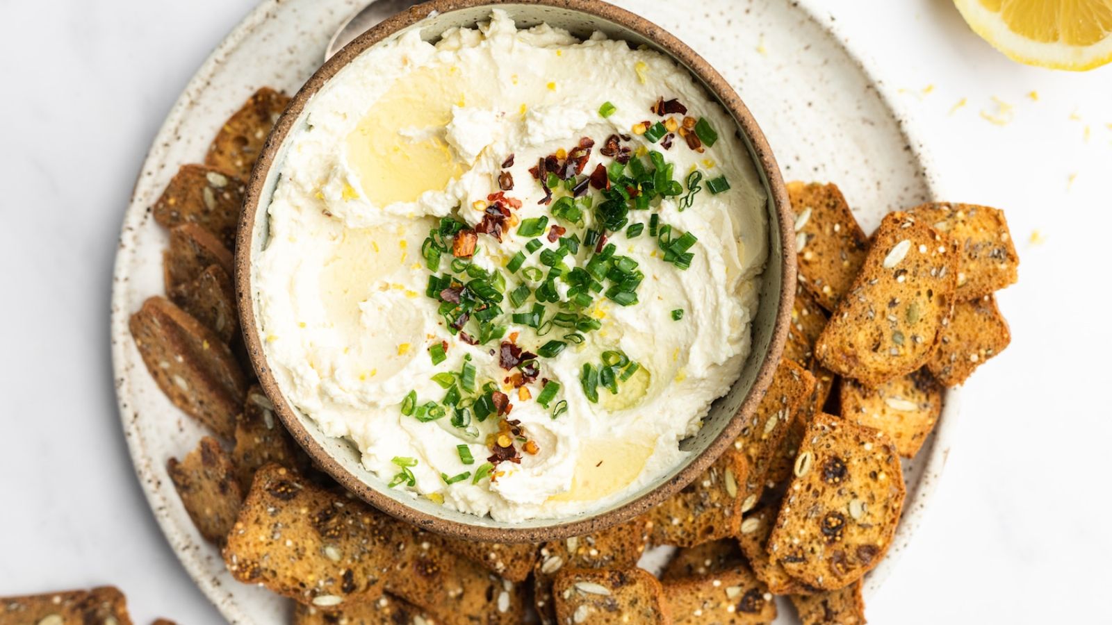 Whipped lemon dip in a bowl.