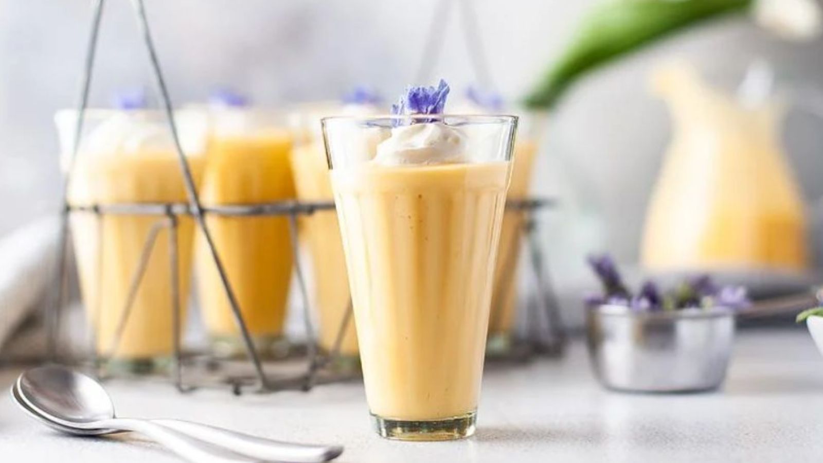 Mango mousse in glasses.