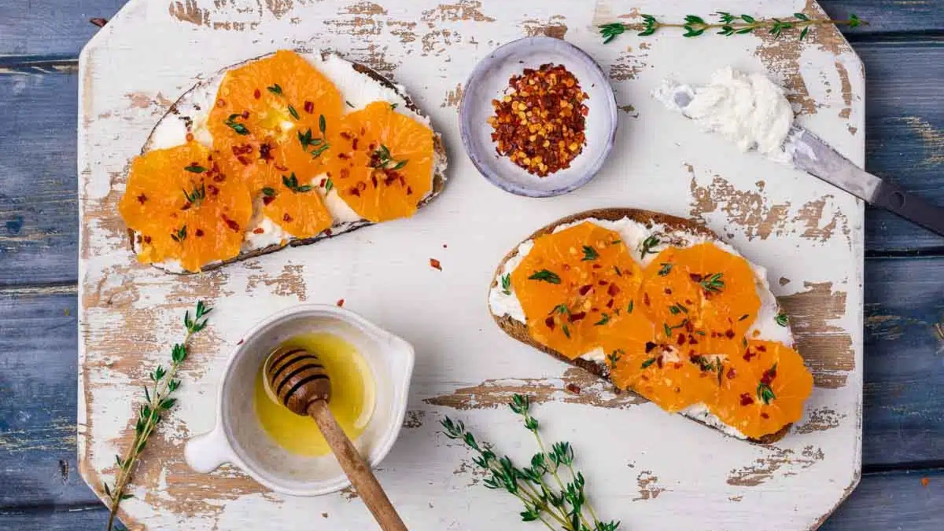 Toast with orange and ricotta.