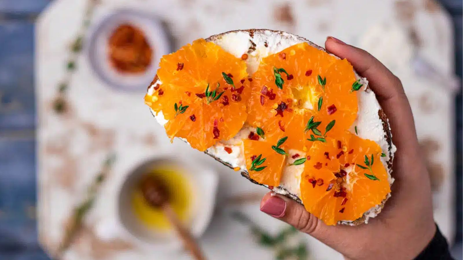 Toast with orange and ricotta.