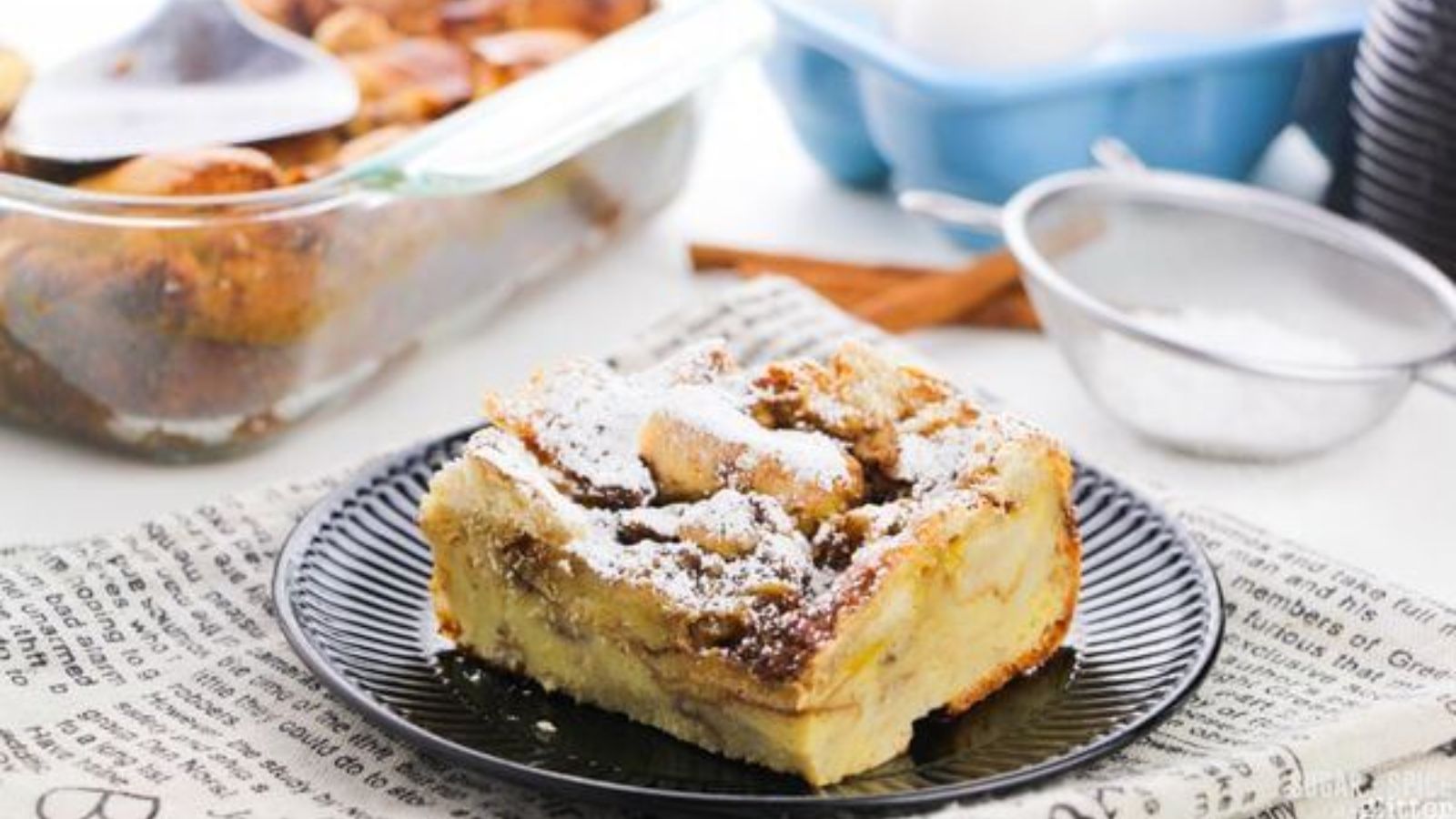 French toast with powder on a plate.