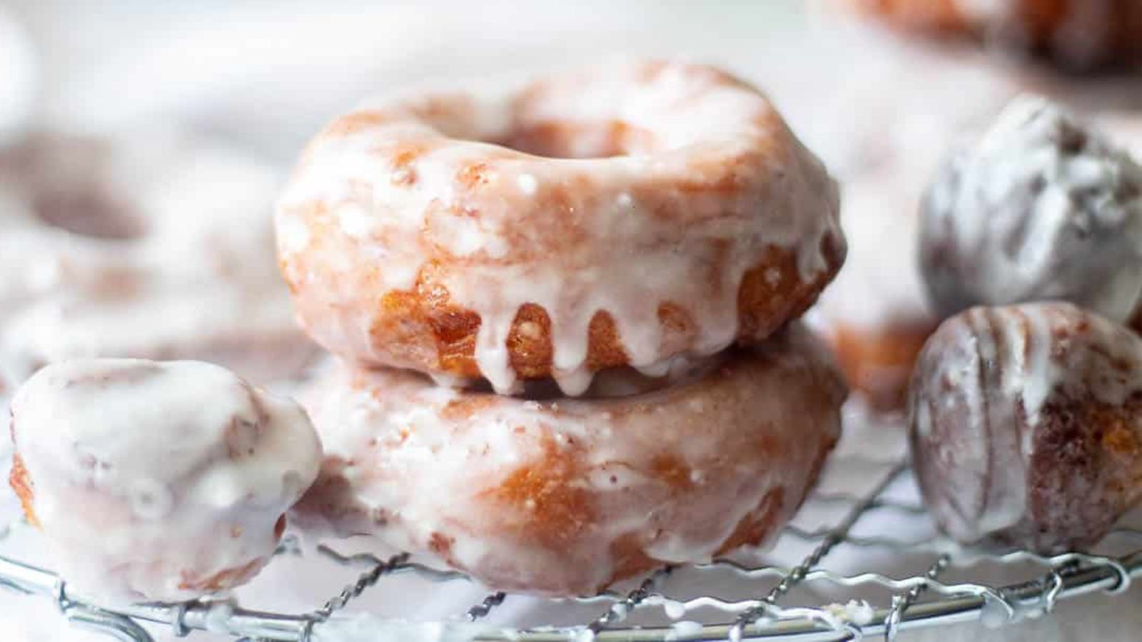 Two donuts with glaze.