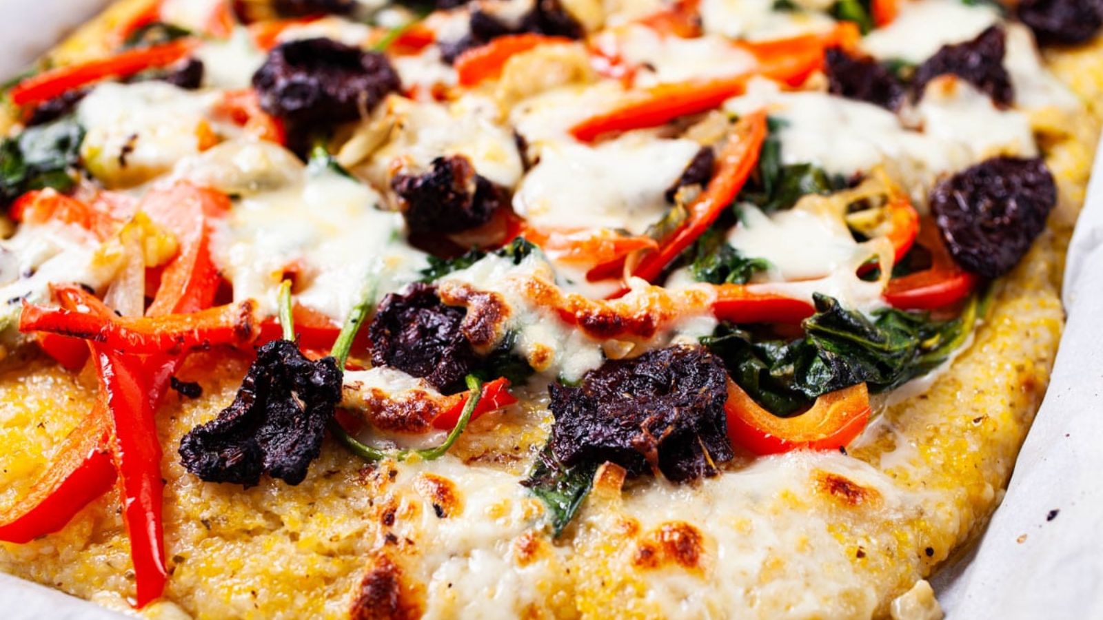 Polenta pizza close up.