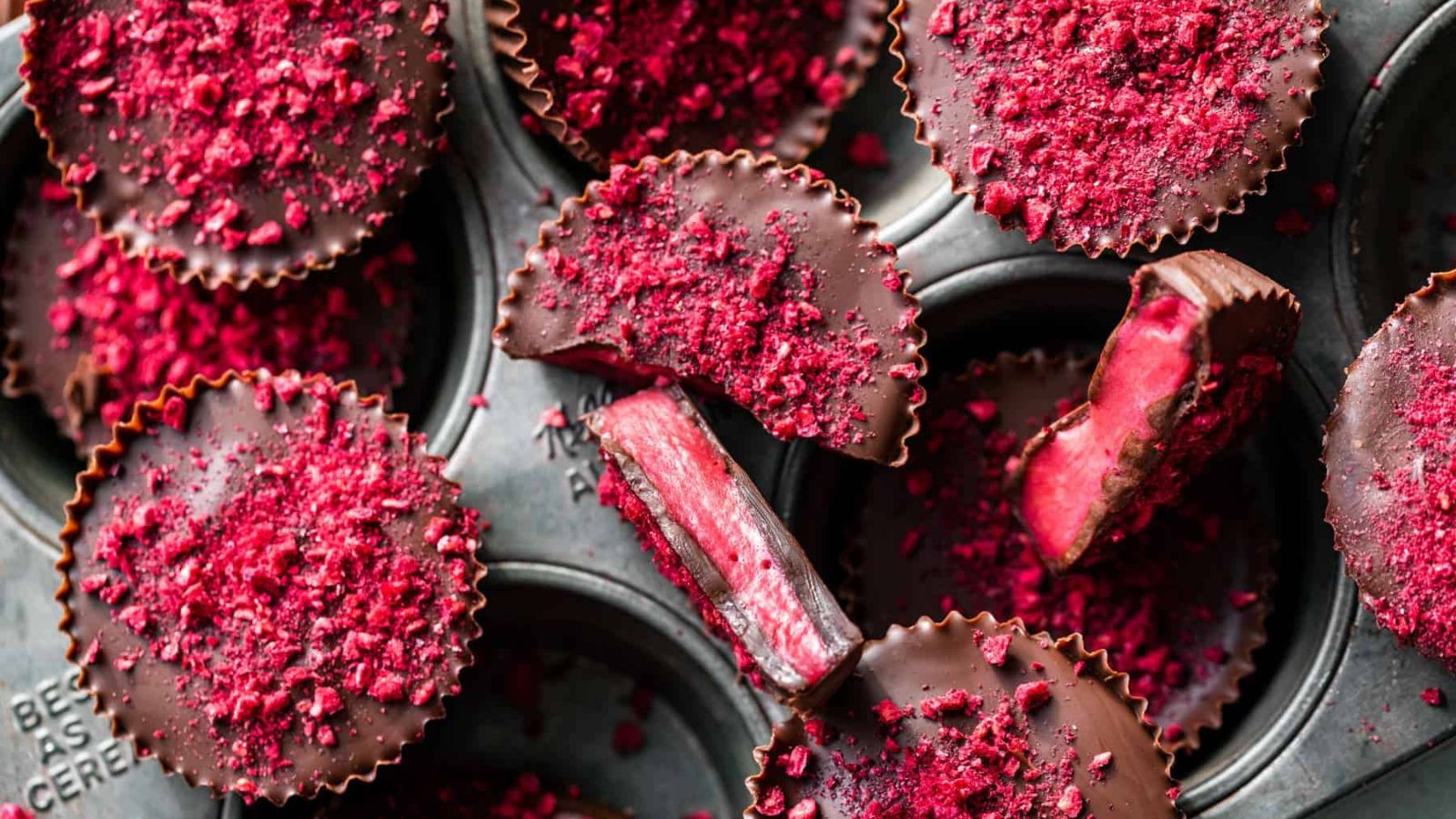 Raspberry chocolates close up shot.