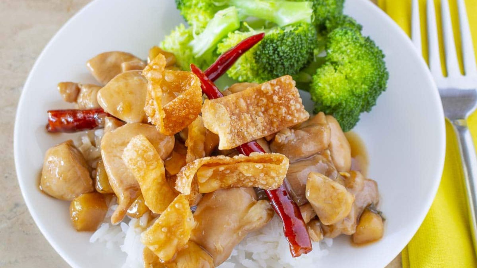 Chicken with broccoli on a plate.
