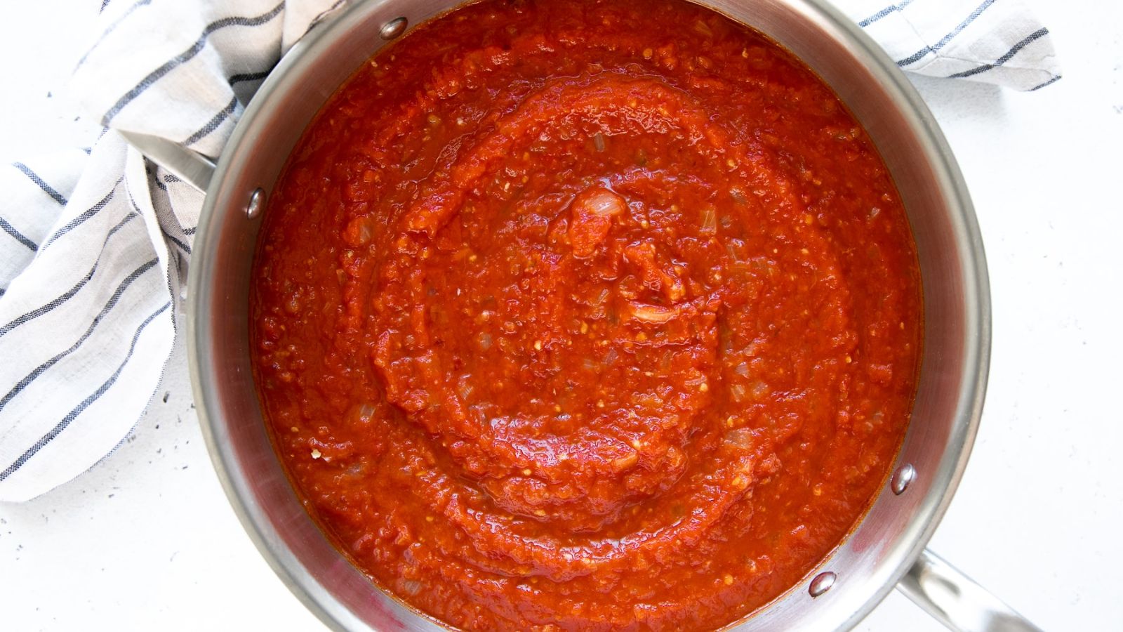 Arrabbiata sauce in a pan.
