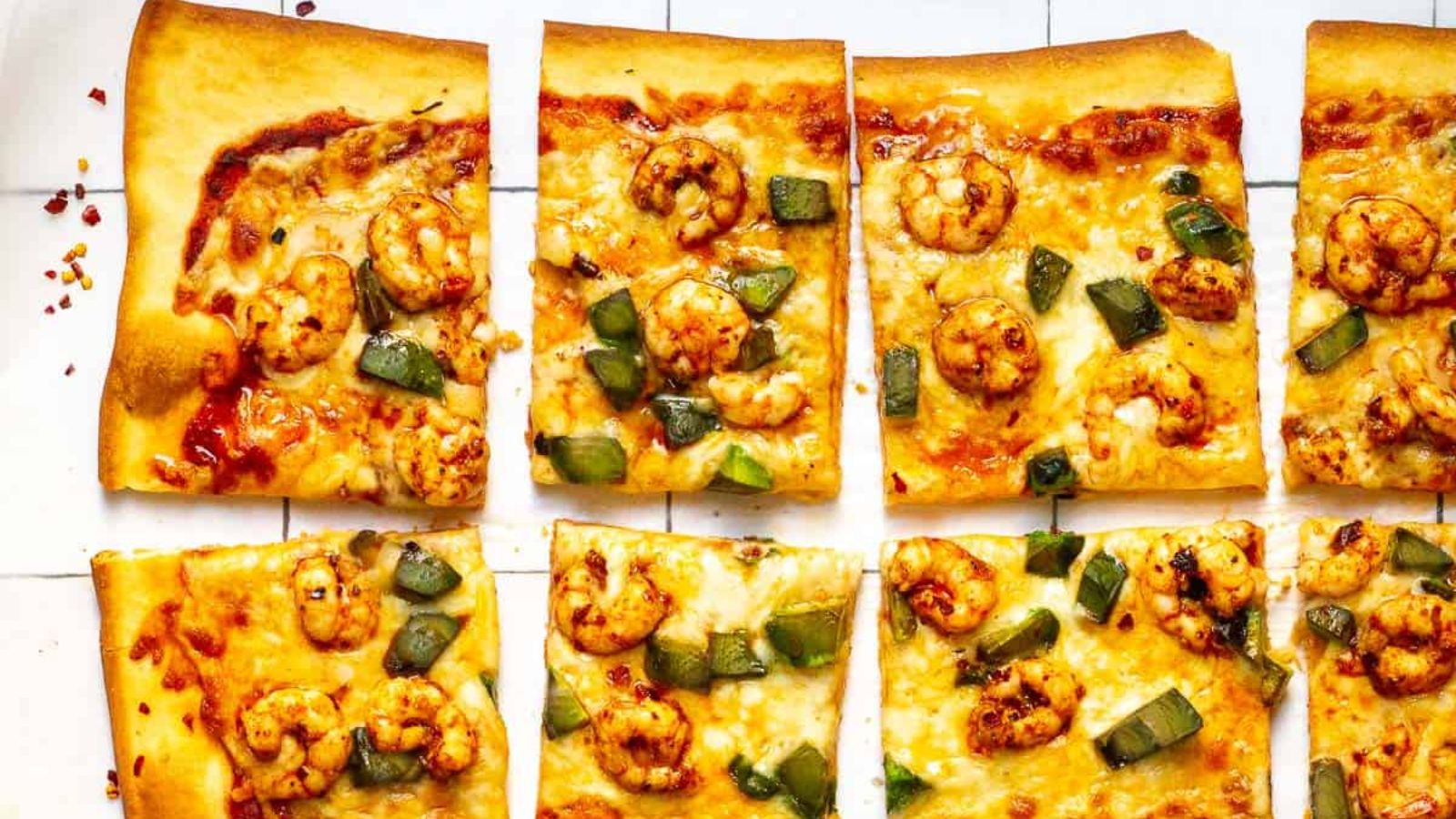 Slices of spicy shrimp pizza.