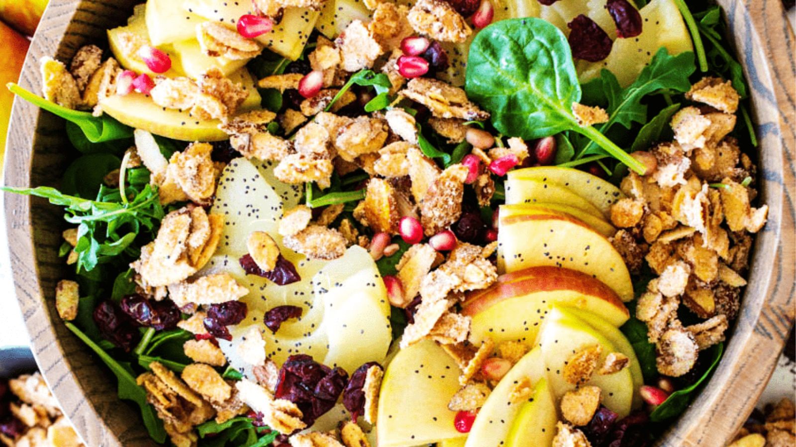 Spinach salad with sliced apples.