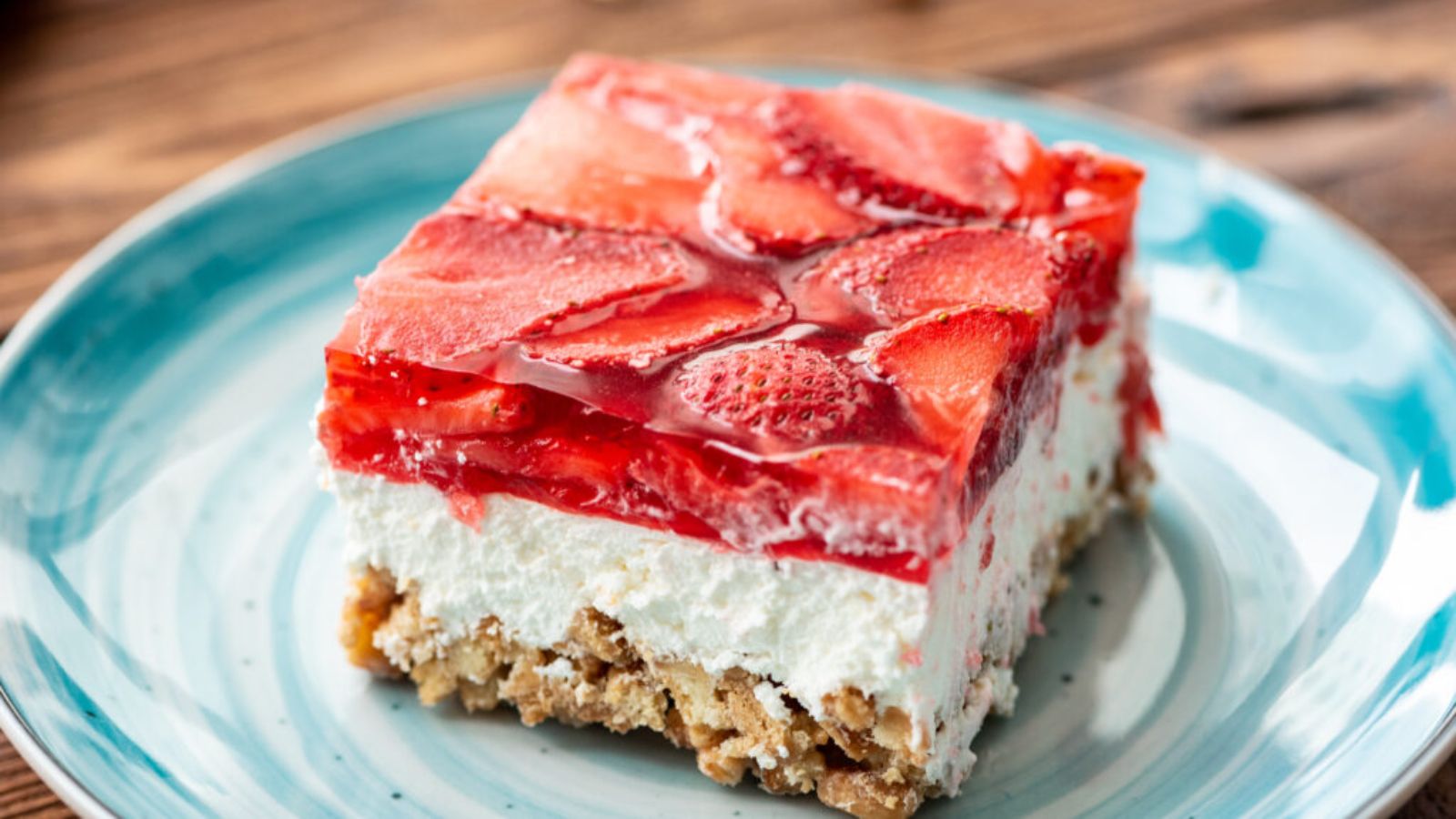 A slice of strawberry pretzel salad.