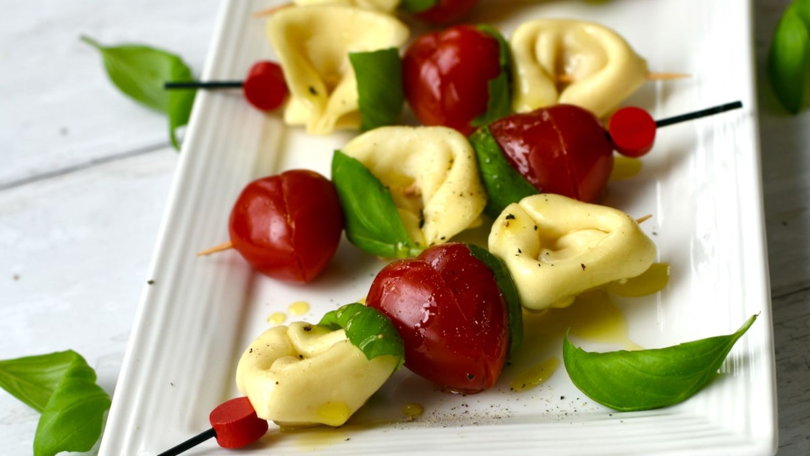 Tomato and mozzarella on sticks.