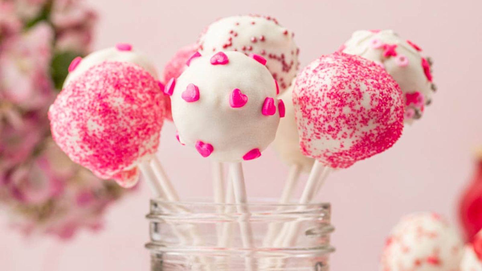Valentine cake pops on a jar.