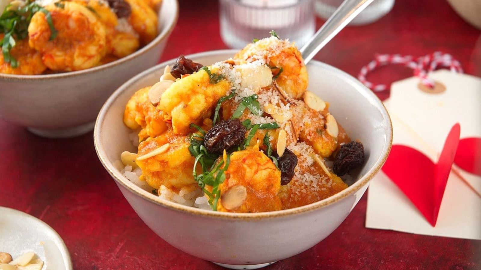 A bowl of shrimp curry skillet.