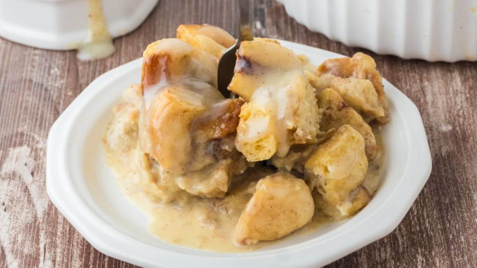Cinnamon roll bread pudding on a plate.