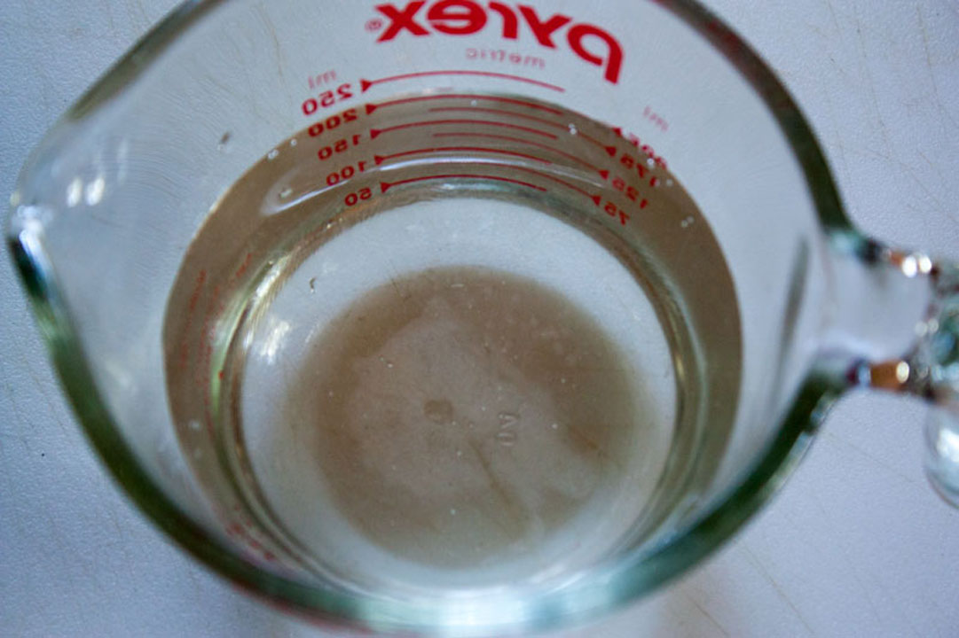 Measuring liquids in a measuring cup.