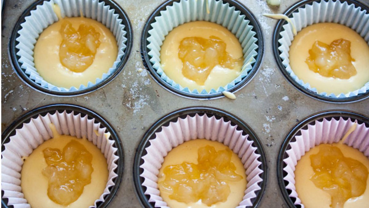 Filling added to the cake batter in the cupcake tins.