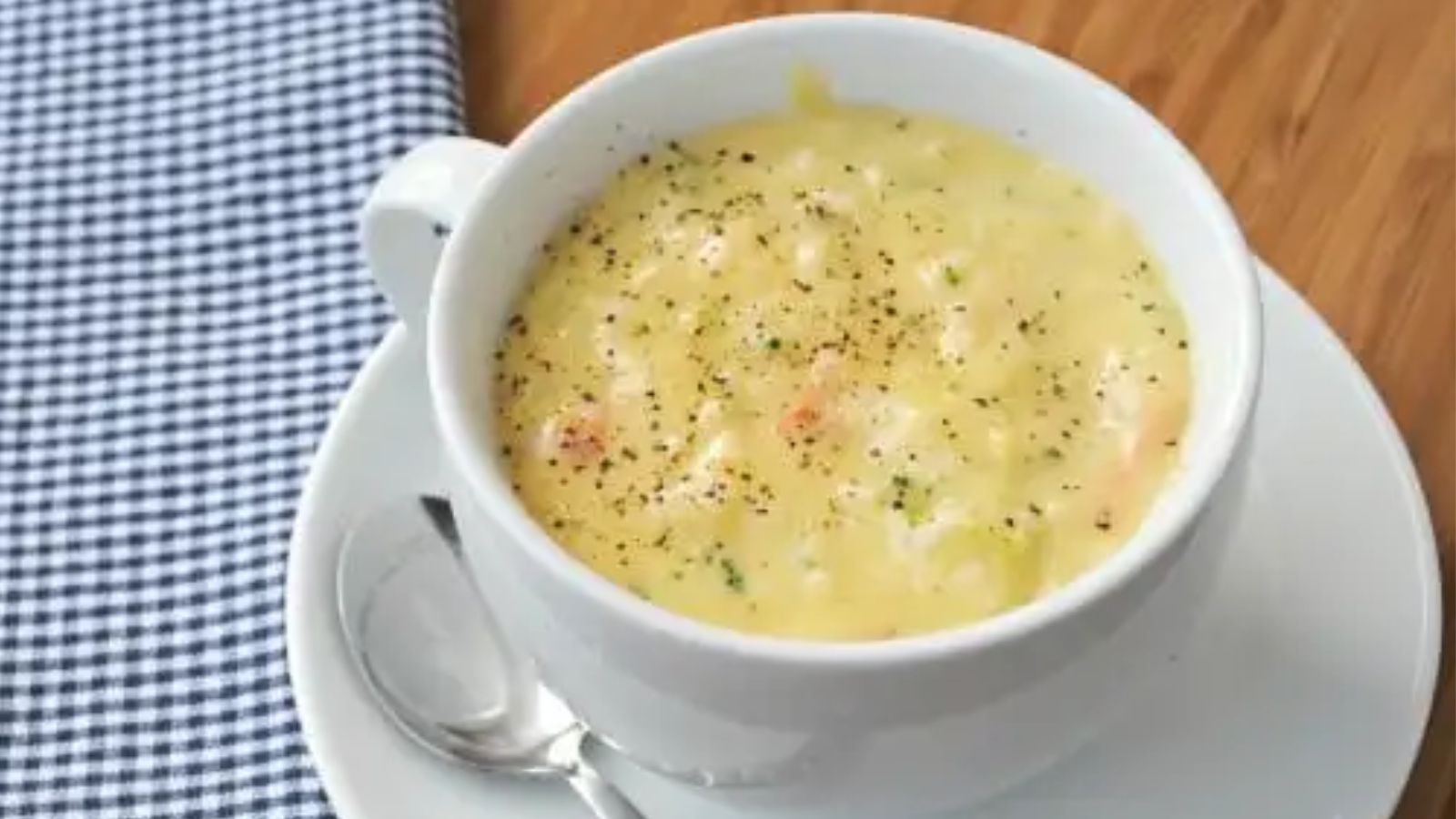 Chicken and rice soup in a mug.