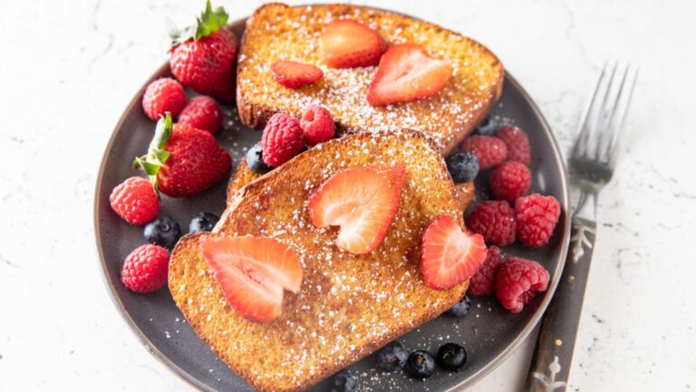 French toast dusted with powdered sugar and serve with fresh berries.